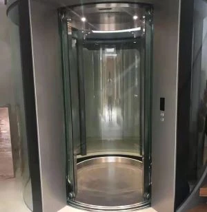 Ascensor de pasageri din cabina rotundă